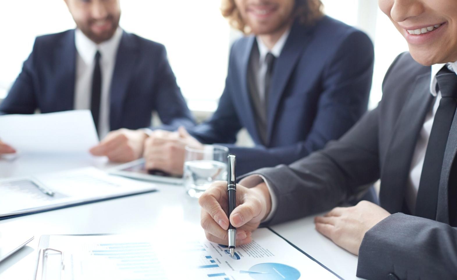 Startup team reviewing quarterly financial performance